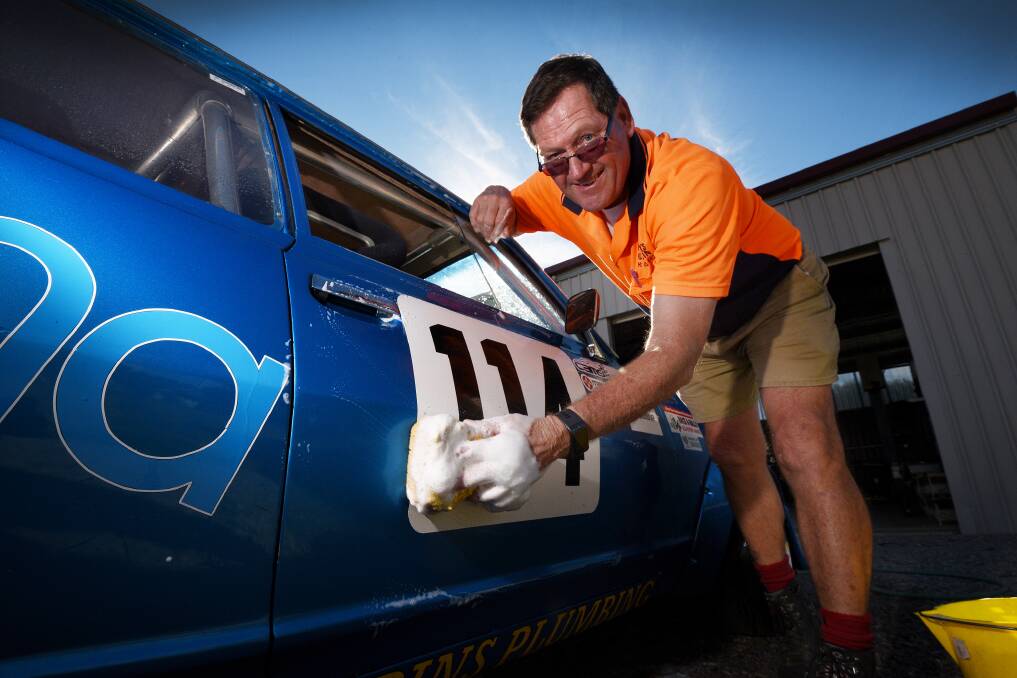 Ready to race: Matt Halpin polishes up his Torana. Photo: Gareth Gardner
