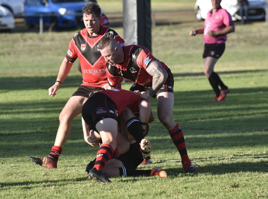 North Tamworth backrower Josh Schmiedel, here coming in to assist with a tackle, topped the best and fairest points in the Bears' win over Werris Creek. Photo: Billy Jupp