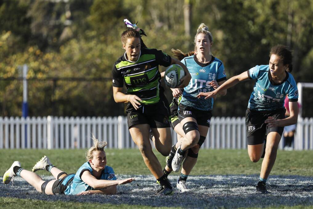 Star rising: Rhiannon Byers, here bursting through the line against UTS in the opening round of the Aon Uni 7s, has been named in the Aussie women's team for the opening leg of the World Series. Photo: RugbyAU Media/Karen Watson. 