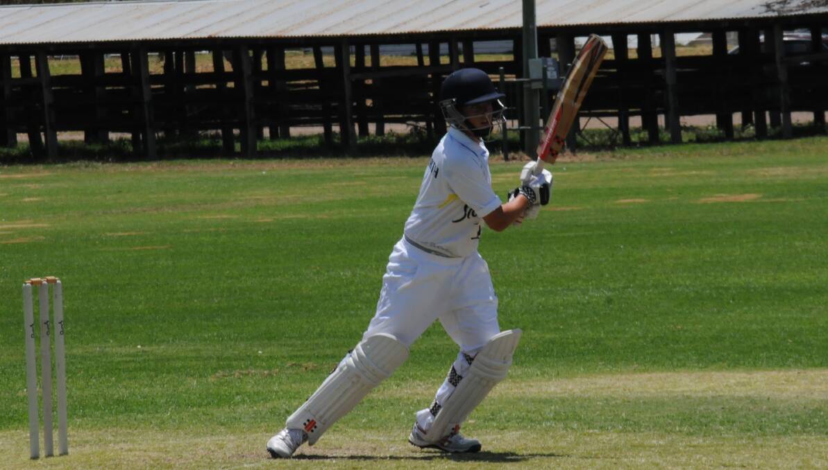 Rep duties: Tamworth's Oscar Spinks looks for runs during an earlier juniors clash. He's off to Griffith this week with the Central North U14s.