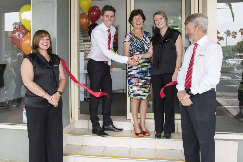Spokes (second from left) at the opening of the new LJ Hooker office in 2018. Photo: Peter Hardin
