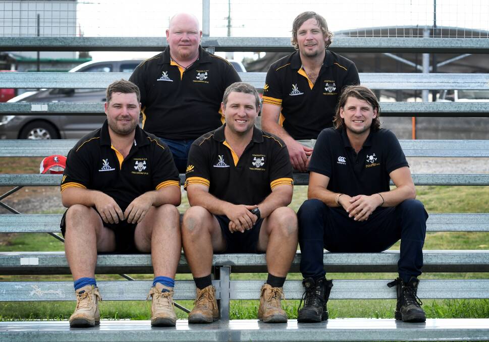 The hard wok begins: Pirates' coaches Back (L-R) Jeremy Maslen (under-18s) and Matt Grinter (under-19s), Andrew Bowden (women's), Mat Kelly (first grade) and Luke Buchanan (second grade) are ready and raring to go for the 2019 season. Photo: Gareth Gardner