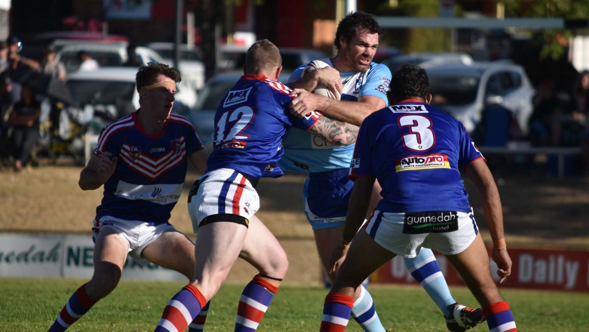 Big clash: Narrabri's Lachlan Cameron takes on the Gunnedah defence earlier this season. The two sides resume hostilities on Saturday.