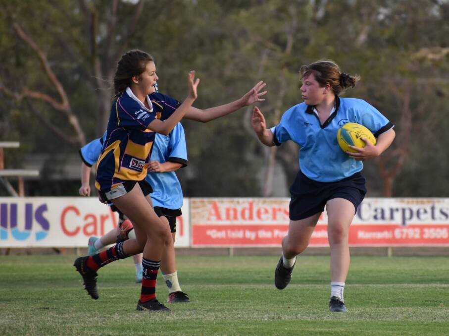 Having a ball: Luci Coffey in action for the Narrabri's 13s against Coonabarabran.