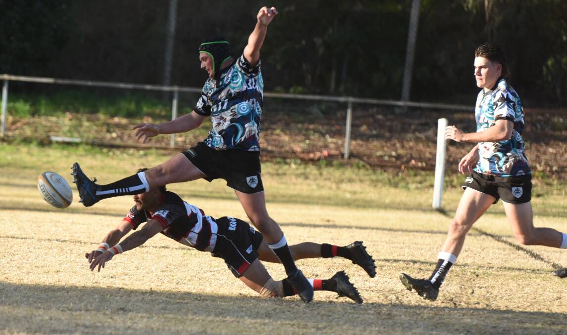 Bayes' timely boot prevented a try in their win over Baa Baas. Picture by Samantha Newsam