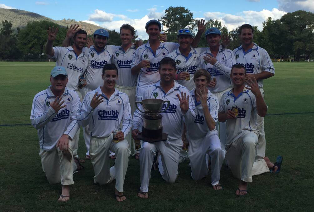 Four in a row: Old Boys pose with the Wombramurra Rose Bowl Trophy which they secured for the fourth straight year with a five wicket win over South Tamworth.