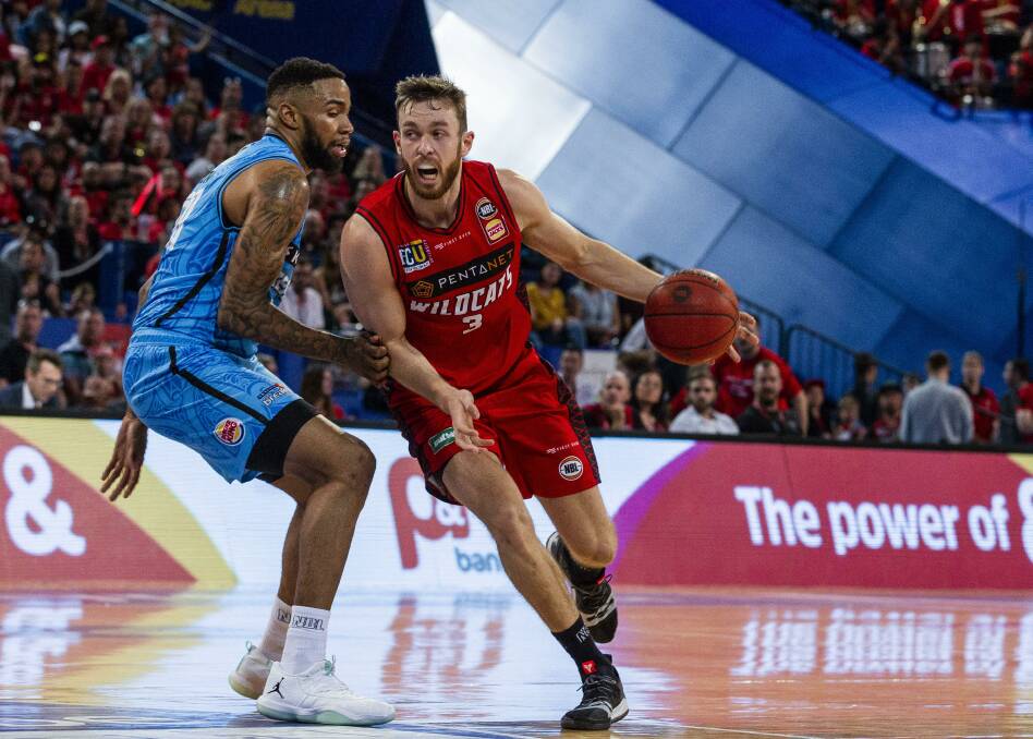 Nick Kay on the charge for the Wildcats during their win over the New Zealand Breakers on Sunday. Photo: AAP Image/Tony McDonough