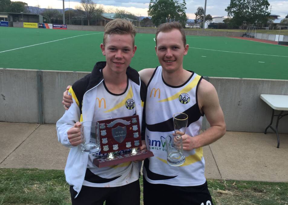 Brothers in arms: Calvin and Isaac both celebrated individual success on top of their premiership.