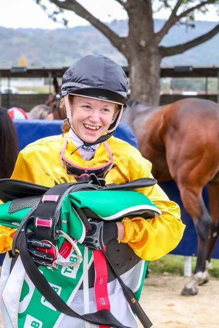 Double the reason to celebrate: Tamworth apprentice Yvette Lewis, pictured here last year all smiles after winning her first race with her first ride, rode a double at Monday's Grafton meeting. Photo: Bradley Photographers