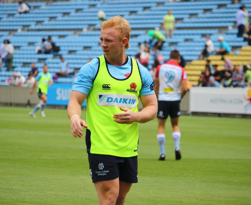 Will McDonnell warms up for the Waratahs clash with the NEC Rockets.