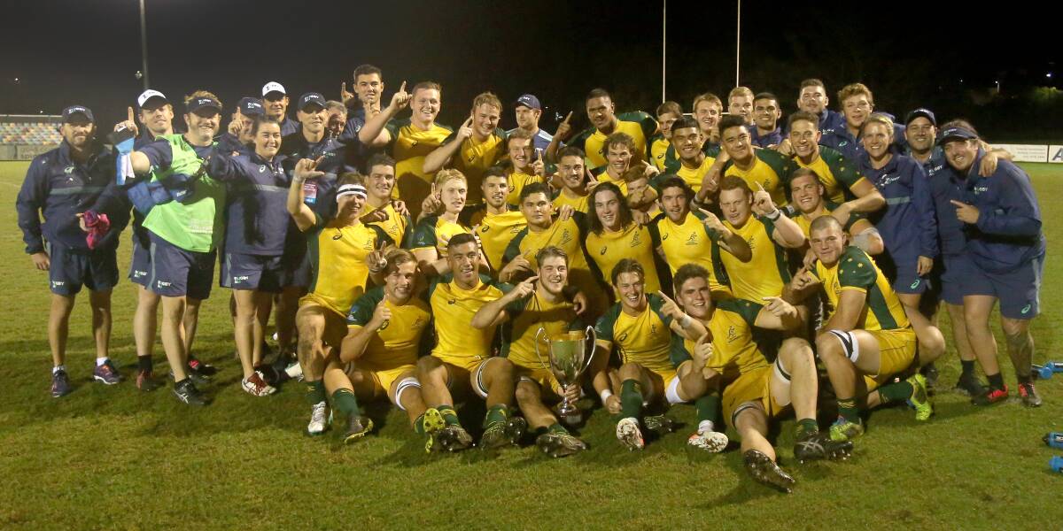 Abra and his victorious Junior Wallabies team-mates celebrate their Oceania Cup triumph.