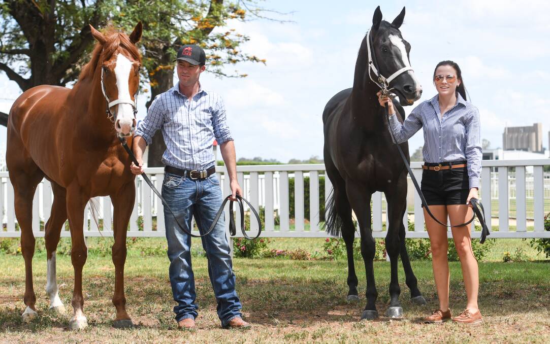 Moobi (left) being held by trainer Cody Morgan, and Anaita, being held by Nevada Mansfield, provided a winning double for Morgan at Scone on Monday. Photo: Gareth Gardner 