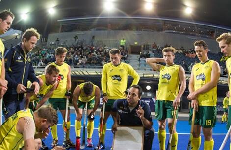All ears: Tamworth's Matt Willis (19) listens to coach Paul Gaudoin's instructions during the Kookaburras opening win over India at the International Festival of Hockey. 