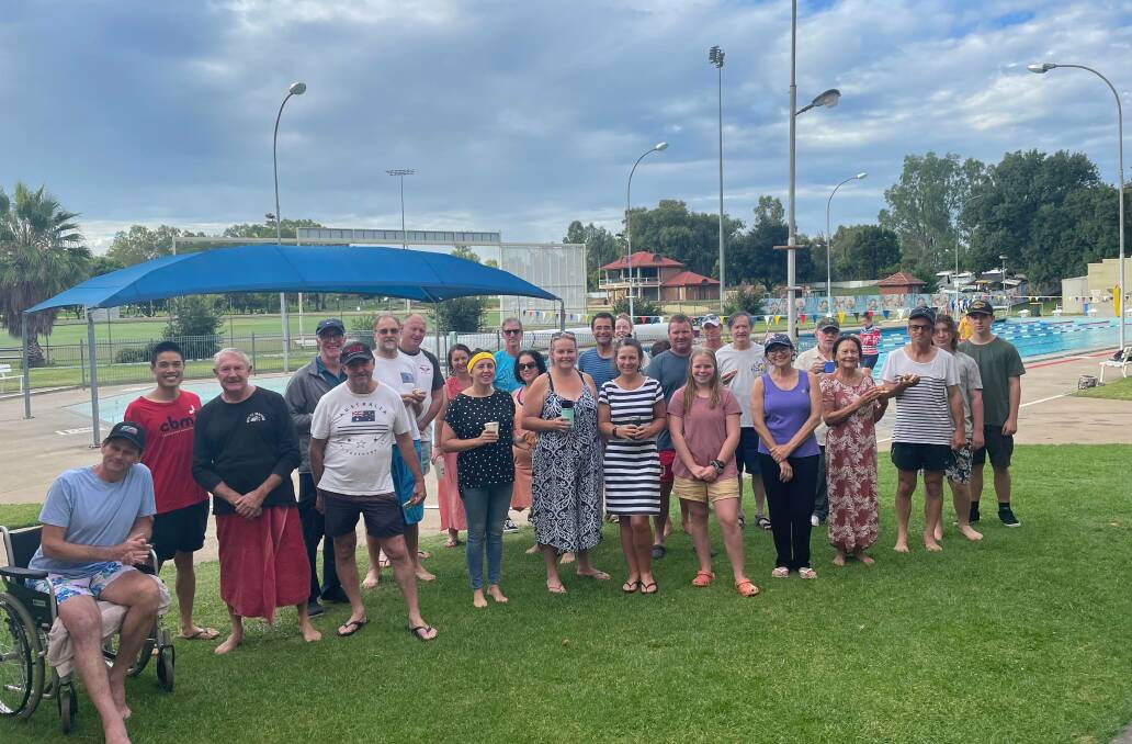 In the spirit: The Tamworth morning swimming squad celebrated Australia Day in typically Aussie fashion on Wednesday - with a swim and a barbecue.