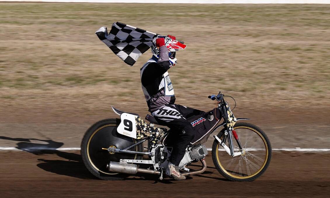 How good!: Michael Slade soaks up his victory lap after winning the unlimited slider class at the national long track championships held on the weekend. Photo Sheree Griffin