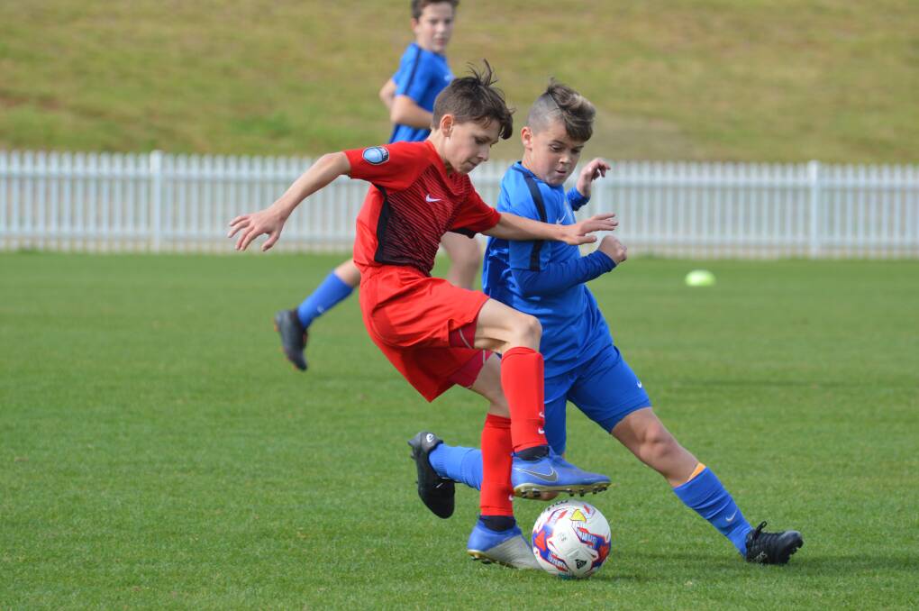 Exciting times: The likes of Northern Inland under-12s striker Jayden Bender, here in action earlier in the season against Macquarie, are set to benefit from the association's involvement in the Northern League One from next season. 