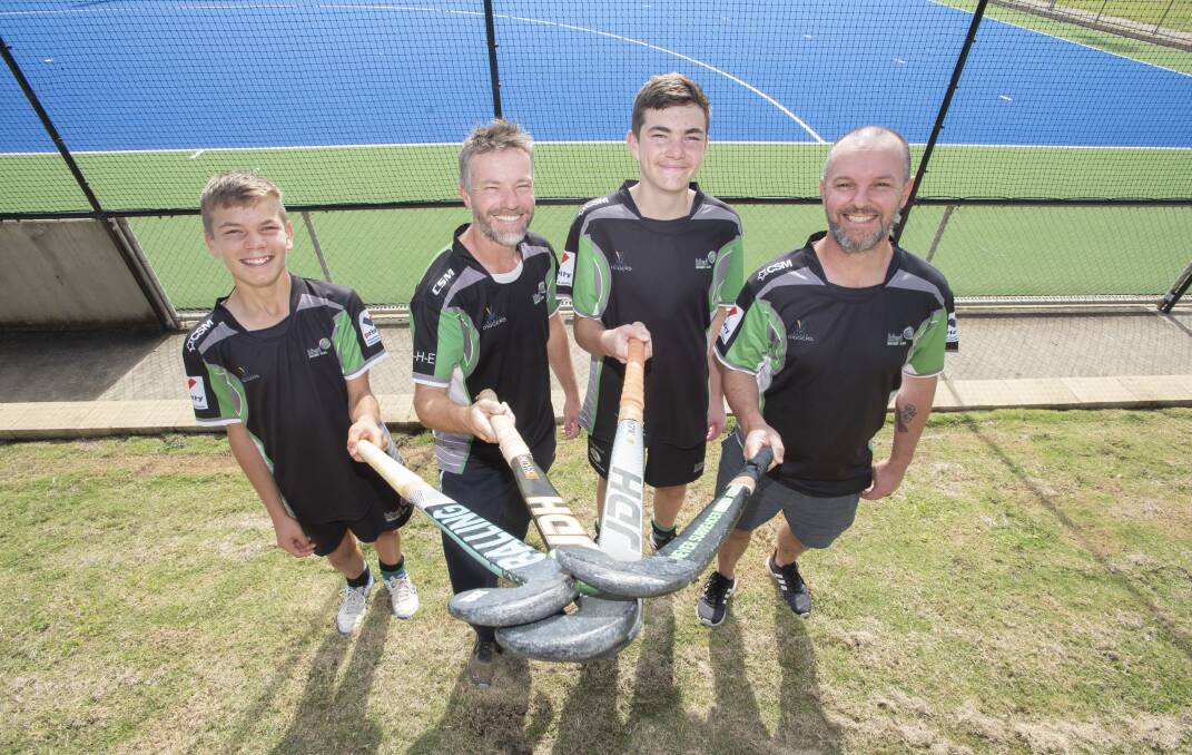Family affair: Mitch Burrows (second from left) has savoured the chance to play with sons Bas (left) and Ollie (second from right) and brother Lindsay. Photo: Peter Hardin 150522B393