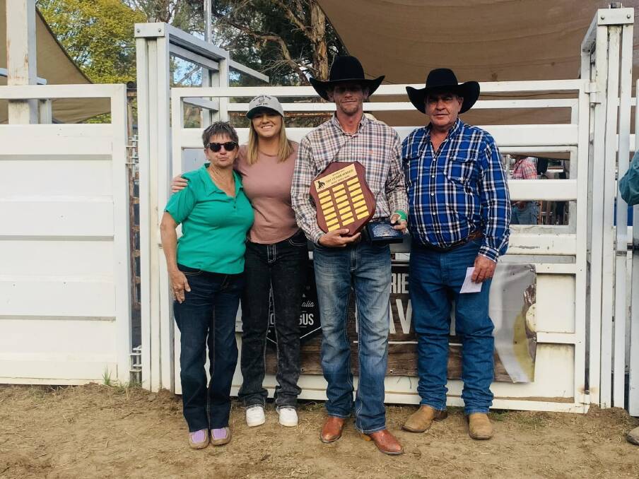 Clint Glass (second from right) receives the inaugural Tony Pittman Memorial Novice Saddle Bronc Shield from Tonys wife Narrelle, niece Tammy, and brother Gordon. Picture Bendemeer Rodeo and Campdraft Facebook.