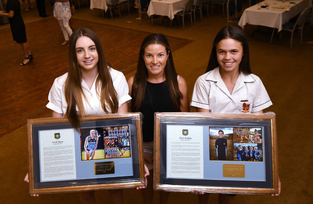 Service Award winner Sarah Byrne, special guest Kate Jenner and Sportsperson of the Year and Most Outstanding Secondary Athlete Lacie Quigley. Photo: Gareth Gardner