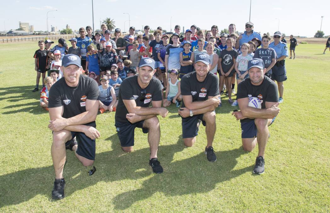 Star power: League legends Beau Scott, Brad Fittler, Mark Hughes and Danny Buderus gave some young footy fans a thrill at Monday's coaching clinic. Photo: Peter Hardin 180219PHE091