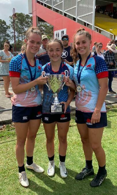 Champion effort: Phoebe McLoughlin, Jada Taylor and Miah O'Sullivan after the National Youth Sevens Championship final, which saw McLoughlin and O'Sullivan's NSW Blue side defeat Taylor's NSW White. Photo: Pirates Rugby Club Facebook