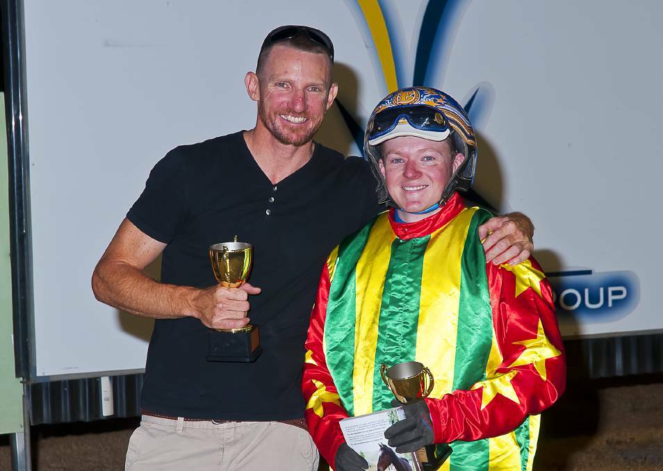 Richard Williams (left) with reinsman Brad Elder after Gottashopearly's Tamworth City Cup win last month.