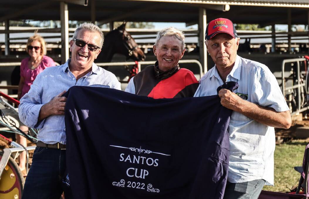 Wish fulfilled: A very happy trainer and driver Dean Chapple with some of the owners after Asterism's win in Sunday's Santos Cup. Photo: Coffee Photography Dubbo
