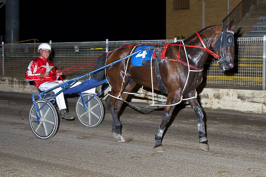 Winding back the clock: Manilla trainer and reinsman Chris Sutherland celebrated his first winner in almost 15 years when Jax Tellar took out the Eco Energy & Solar Solutions Pace. Photo: PeterMac Photography.