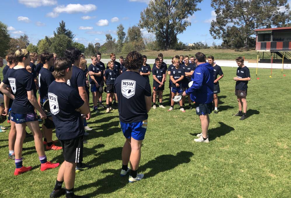 Voice of knowledge: Canterbury Bulldogs Pathways Development Manager Craig Wilson addresses some of the young triallists at Sunday's NIAS combined session at Jack Woolaston Oval.