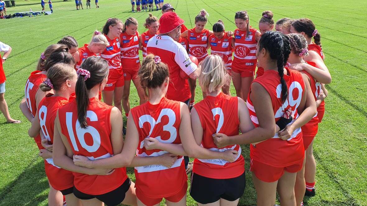 United: Swans women's coach Andrew Donohue, here addressing his charges earlier this season, has set up a competition among his players to keep them engaged during the current COVID-19 shutdown. Photo: Ben Jaffrey