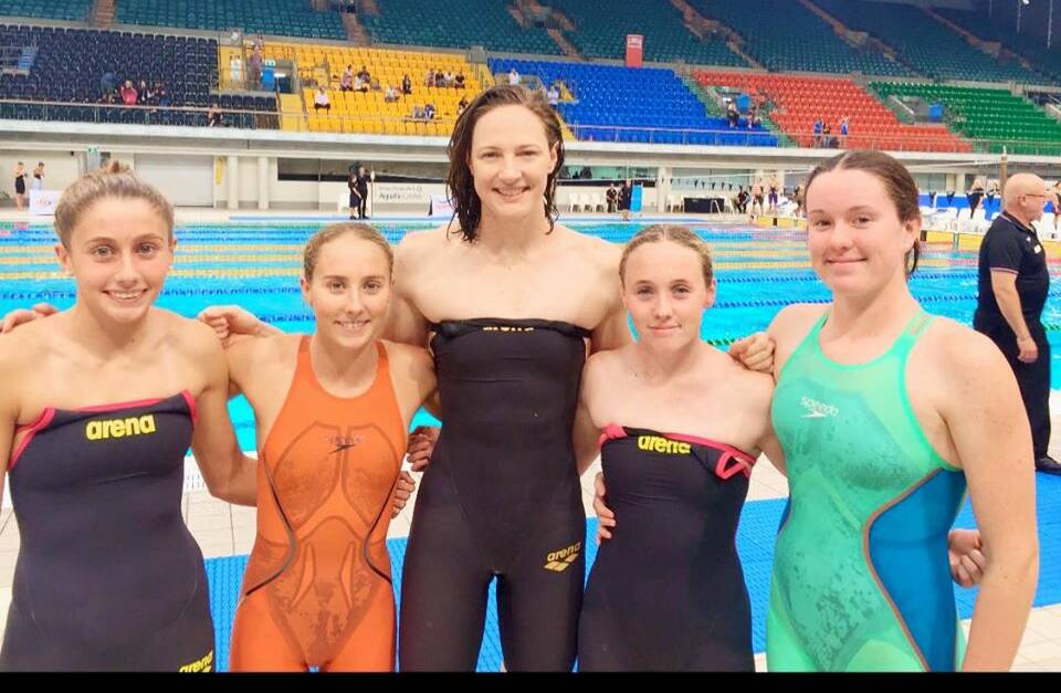 Golden girls: Alex Hayes, Clementine Monet, Grace Milgate and Amelia Simm with Cate Campbell (centre) after their 4x100 medley relay swim. Photo: Tamworth City Swimming Club Facebook