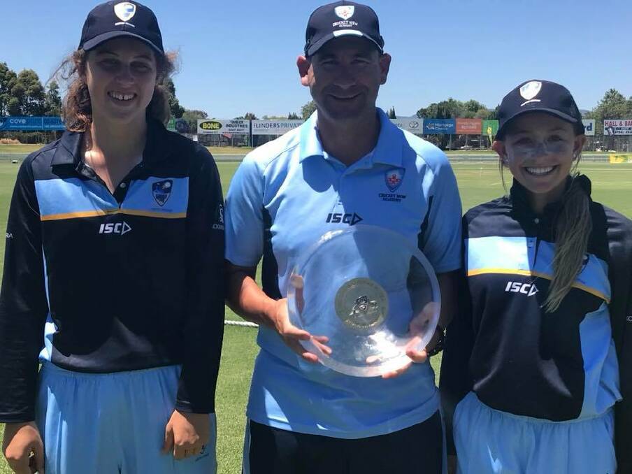 On top again: Jess Davidson (left) and Deni Baker (right) with Luke Knight, who was assistant coach of the successful ACT/NSW Country side with the silverware. Photo: Central North Facebook