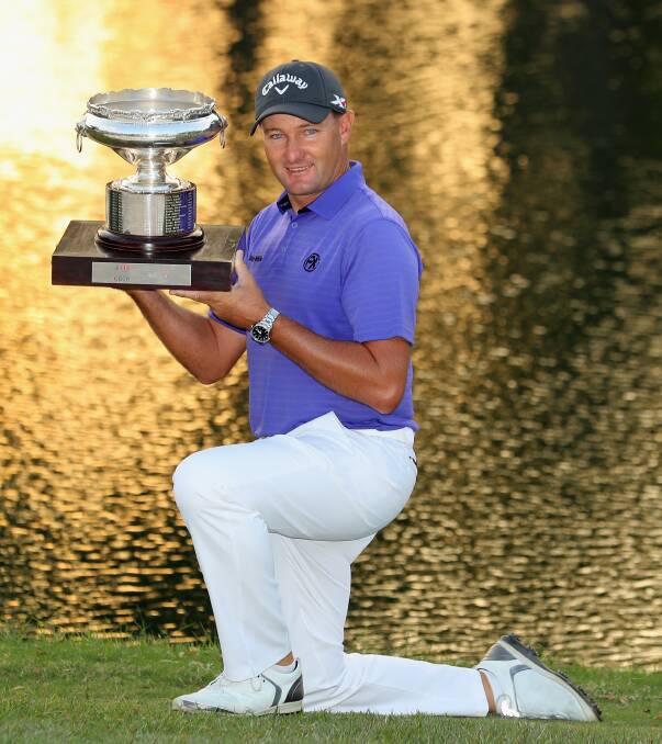 Champion: Former Longyard golfer Sam Brazel poses with the trophy after winning the UBS Hong Kong Open with a final hole birdie. It was the 37-year old's first title on the European Tour. Photo by Warren Little/Getty Images