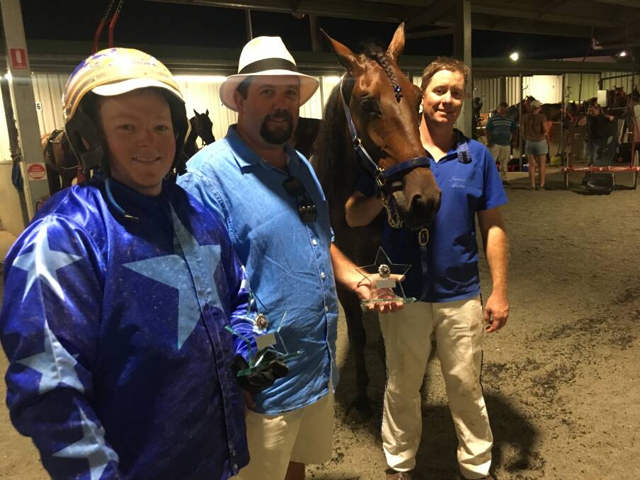 Star appeal: Reinsman Brad Elder, owner Scott Whitton and trainer Jarrod Alchin with My Ultimate Star after taking out Sunday's Star Maker final. Photo: Julie Maughan