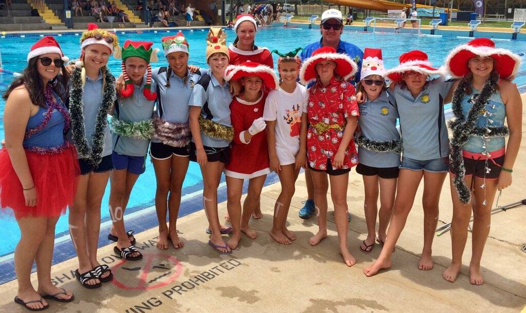 Hannah Irwin and her Tamworth under 14s team-mates get in the festive spirit at the state under 14 championships. 