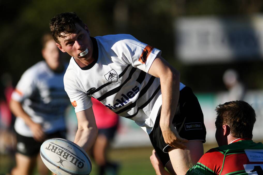 Meeting the challenge: Tamworth winger Billy McNaughton looks to offload against St Alberts in the opening round. The Magpies face another student side on Saturday in the form of Robb College. Photo: Gareth Gardner