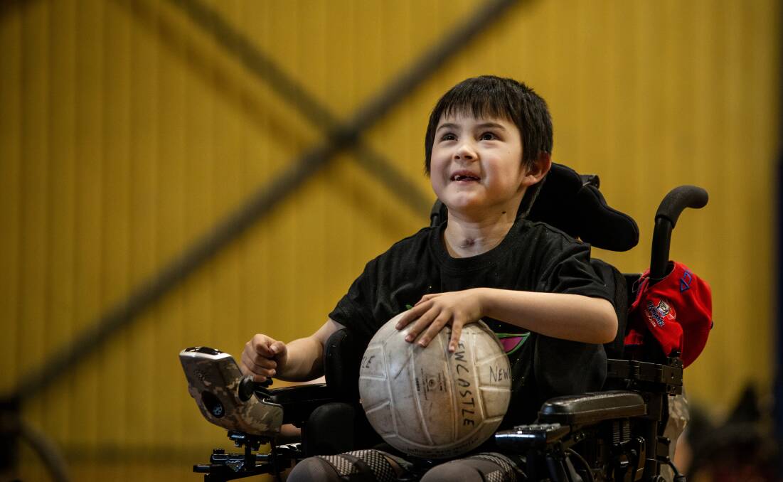 All smiles: David Plummer said son Raphael had a ball at the Junior Wheelies School Holiday Camp held in Newcastle during the last school holidays. Picture: Marina Neil