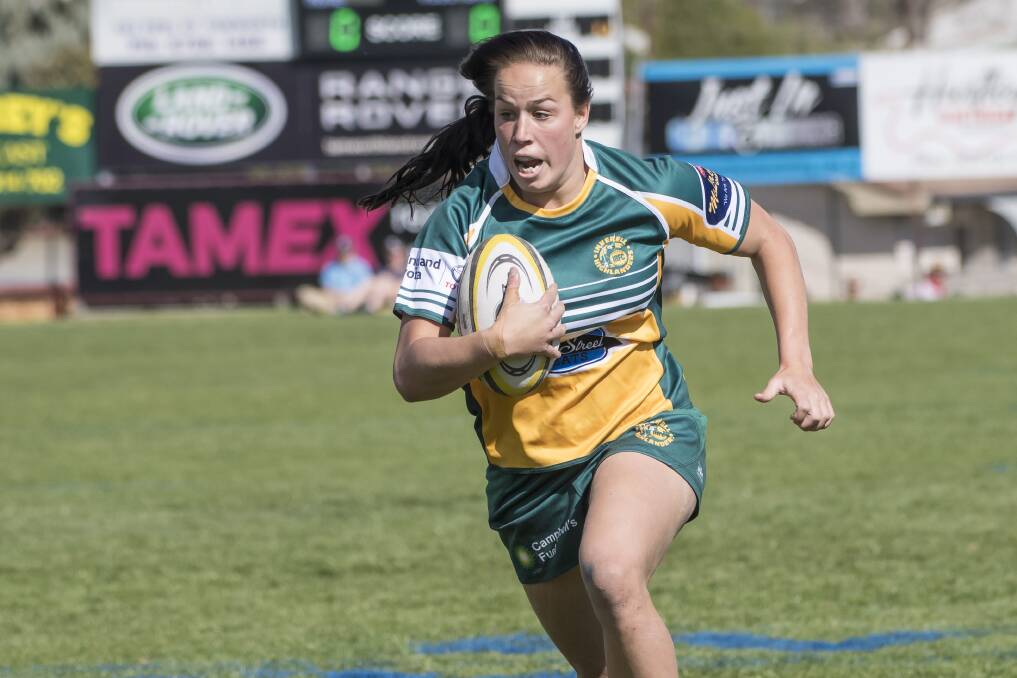 Whirlwind: Here in action for Inverell in last year's Central North women's 7s grand final, Rhiannon Byers has been offered a full time Australian rugby sevens contract. Photo: Peter Hardin