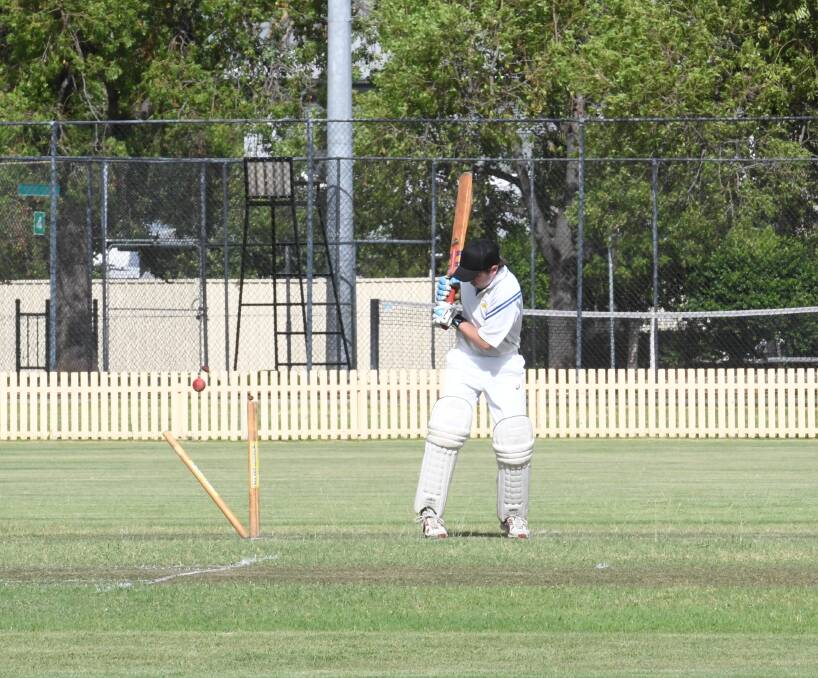 Out: Mornington's Billy Flynn has his stumps rearranged by Brad Jenkinson. 