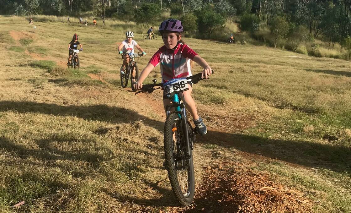 Catch me if you can: Ella Wright tackles the course en route to taking out the Dirtmasters A girls.