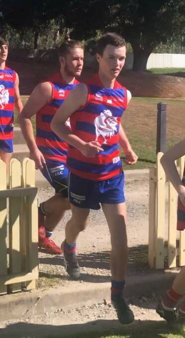 Jacob runs out for the Roosters.