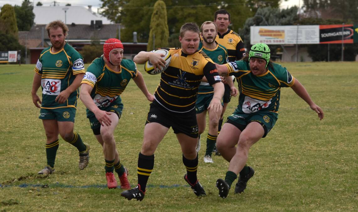 Versatile: Sam Collins, here enroute to the tryline, will again steer Pirates around the park at five-eighth when they face Quirindi. Photo: Ben Jaffrey.
