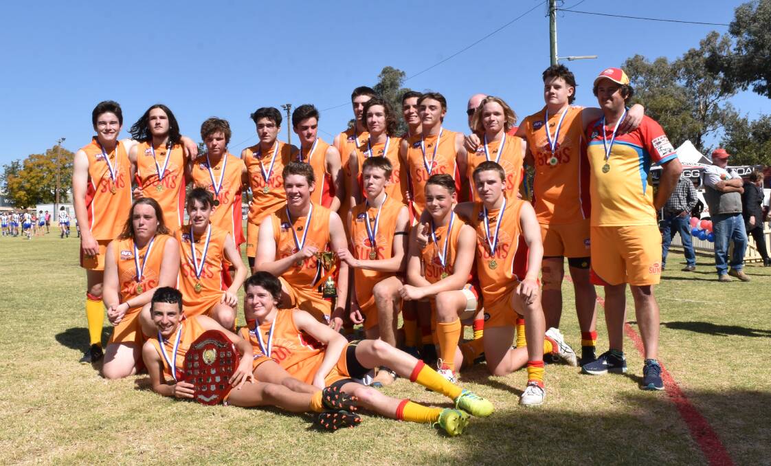 BIG WINNERS: The Moree Suns celebrate their 2019 AFL North West under-17 grand final victory. Photo: Ben Jaffrey 