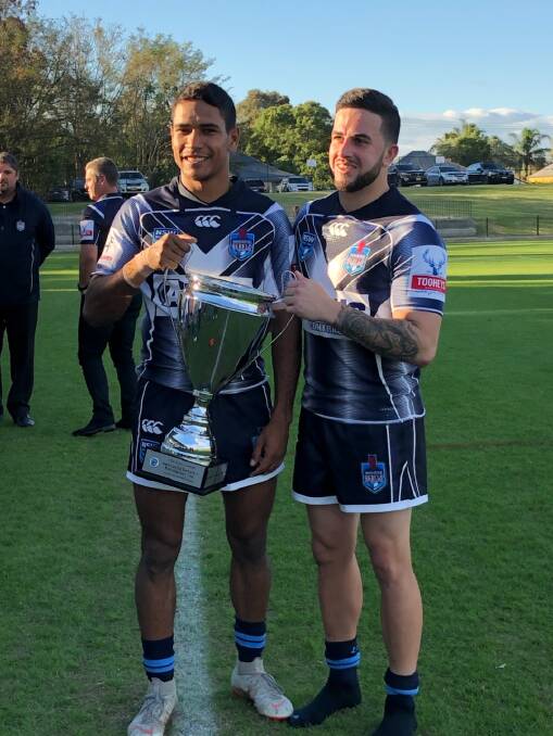 ONTO THE NEXT: Jarom Haines (left) celebrating the Newcastle Rebels win over Ron Massey Cup. He has now been selected in the NSW Pioneers squad to take on the Queensland Rangers. Photo: Lorilie Haines.