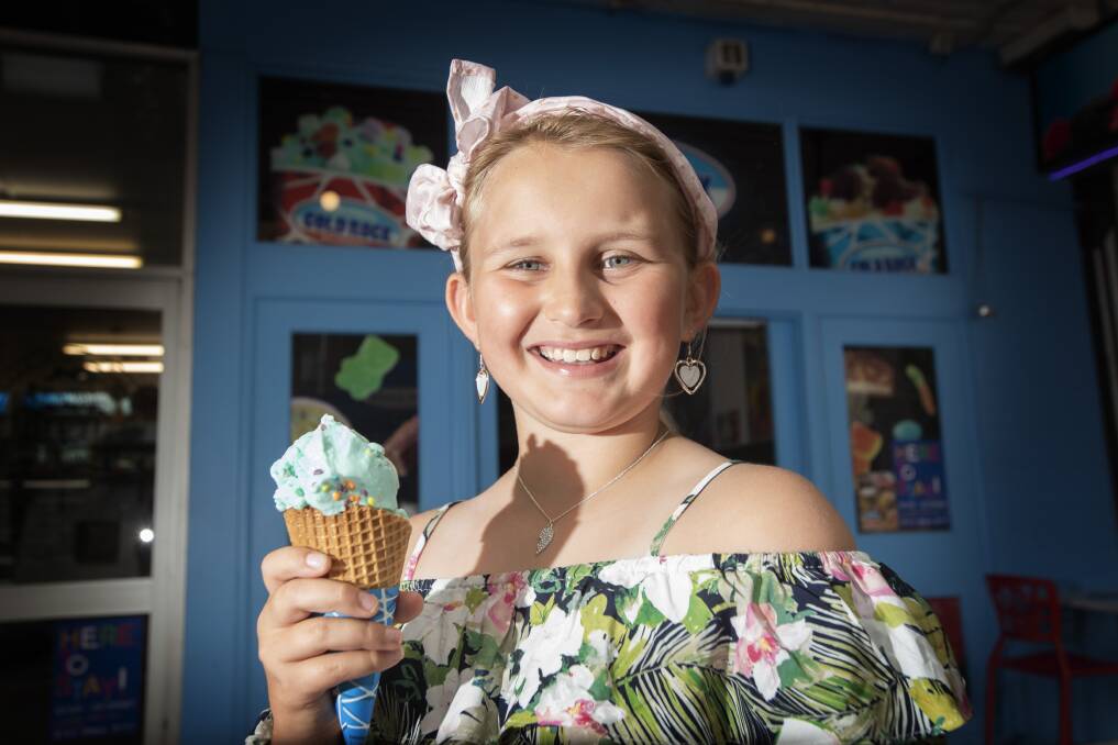 TASTY TREAT: Molly Crawley enjoys a delicious ice-cream from Cold Rock on Peel Street. Photo: Peter Hardin