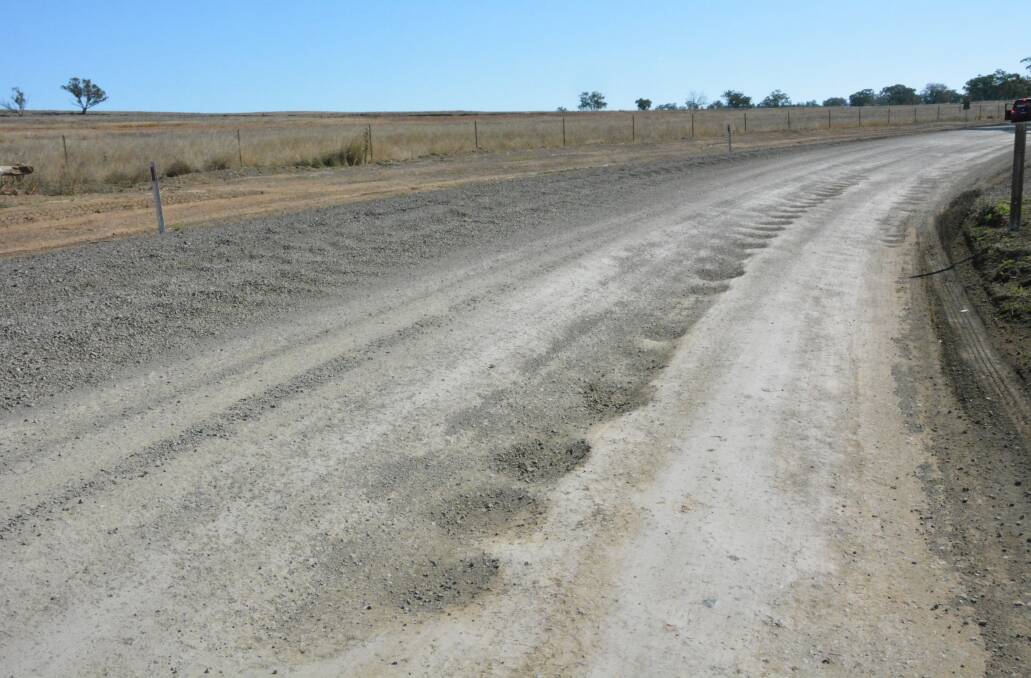 Rangari Road is constantly dotted with potholes. Photo: Jessica Worboys