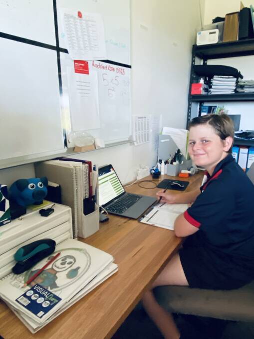 STUDIOUS: Clint Baker throughly enjoys school through eCalrossy, in the comfort of his own home. Photo: supplied