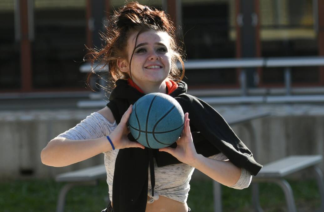 FUN TIMES AHEAD: Brookie Girard shoots a hoop at the Youthie. Photo: Gareth Gardner