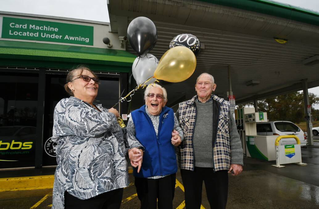WHOLE CENTURY: Clara Palmer (centre) celebrated her 100th birthday alongside her good friend Maree Buckley and partner Phil Strudwick. Photo: Gareth Gardner