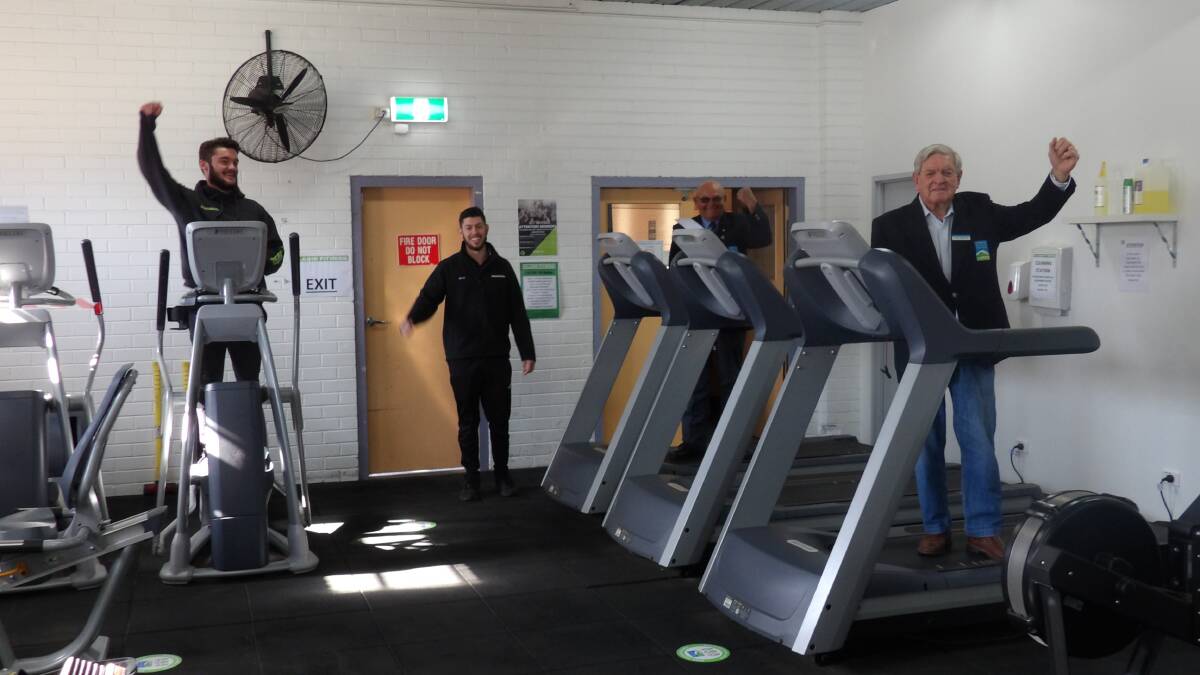 Plains Fitness team members Lucas and Brody are ready to get operations up and running again at the centre and celebrate this event with councillor Doug Hawkins OAM and councillor Ian Lobsey OAM. Photo: supplied